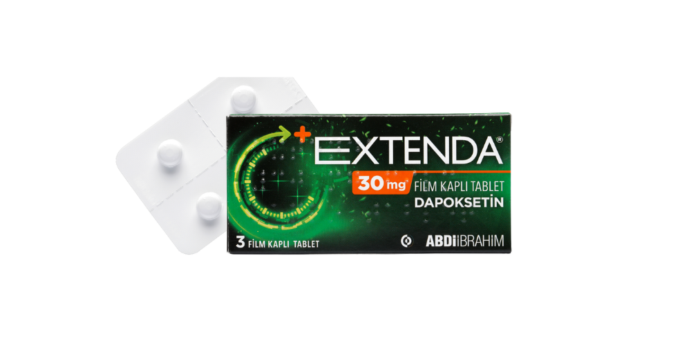 extenda-30-mg-30-tablet "Extenda 30 mg 30 tablet kutusu, dapoksetin hidroklorür içeren film kaplı tablet ilacı, beyaz zemin üzerinde mavi ve sarı tasarımlı ambalaj, Farmatek markası"